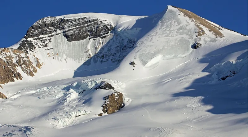 The icefall of the Dome Glacier spilling from the Columbia Icefield plateau
